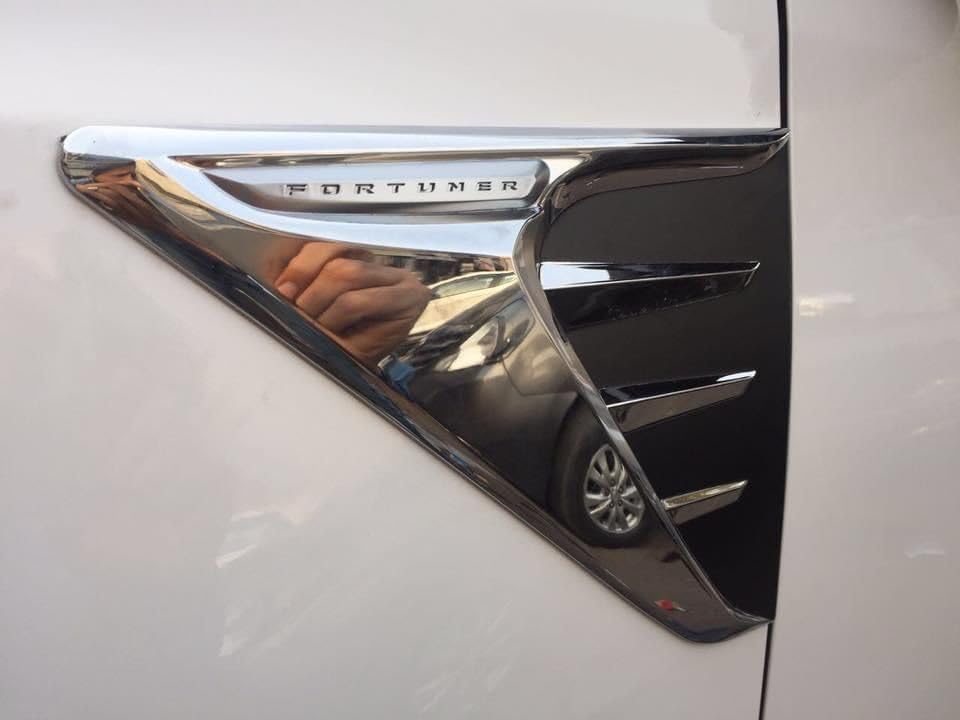 Fortuner 2016+ Side Vent chrome decorative hood cover installed on white SUV