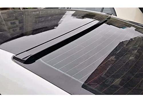 Car rear trunk spoiler wing lip installed on sedan boot lid with glossy black finish