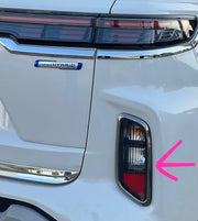 Grand Vitara 2023 reflector chrome trim installed on rear bumper lamp