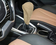 Manual Gear Shift Knob Cover in beige leather with zipper design installed on car gear lever