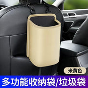 Beige Automaze waterproof car trash bin organizer attached to headrest