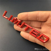 Hand holding a limited metal 3D Car Sticker Logo showing premium red metal finish