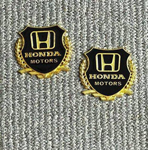 Honda Motor logo pair in golden colour