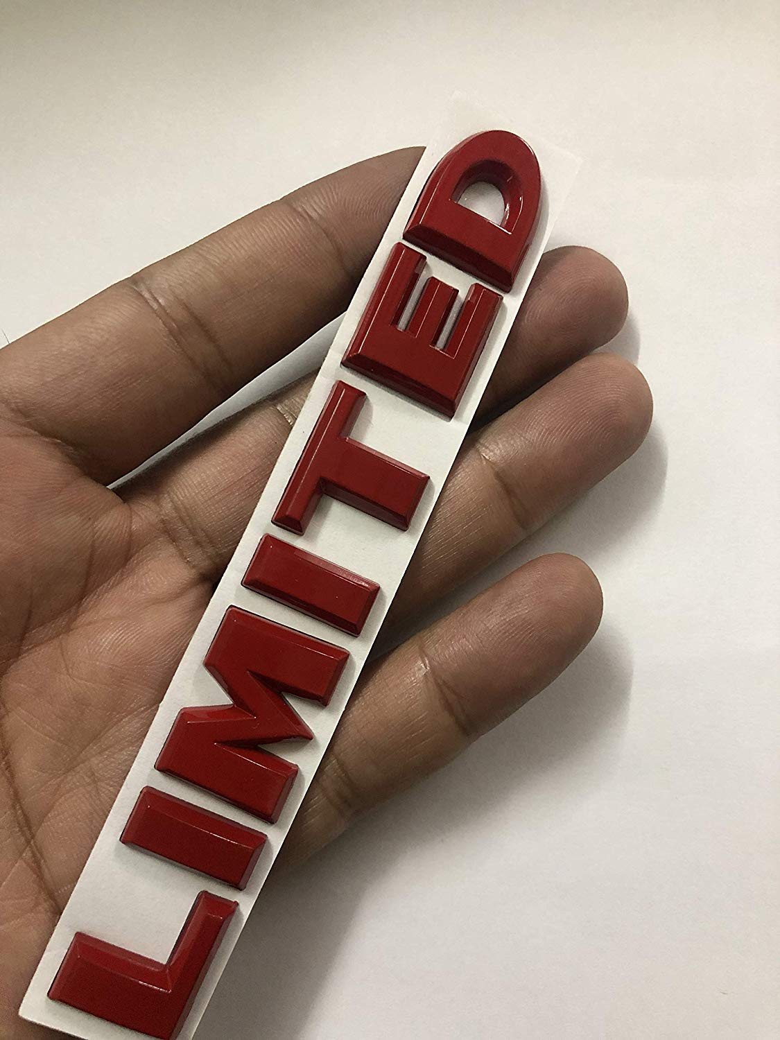 Red Limited letter logo for all cars