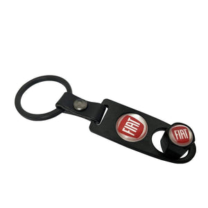 Black keychain with tyre valve cap of Fiat