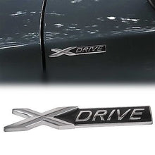 Load image into Gallery viewer, X Drive logo installed on car
